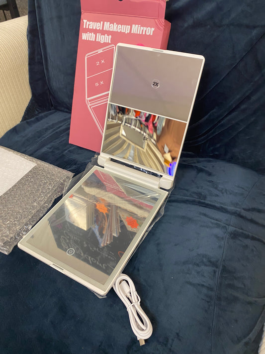 Bi fold LED makeup mirror with magnification