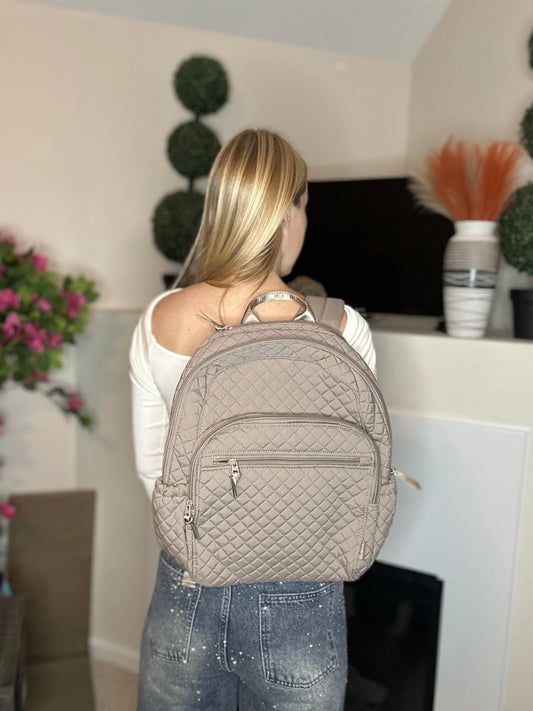 Beige quilted backpack