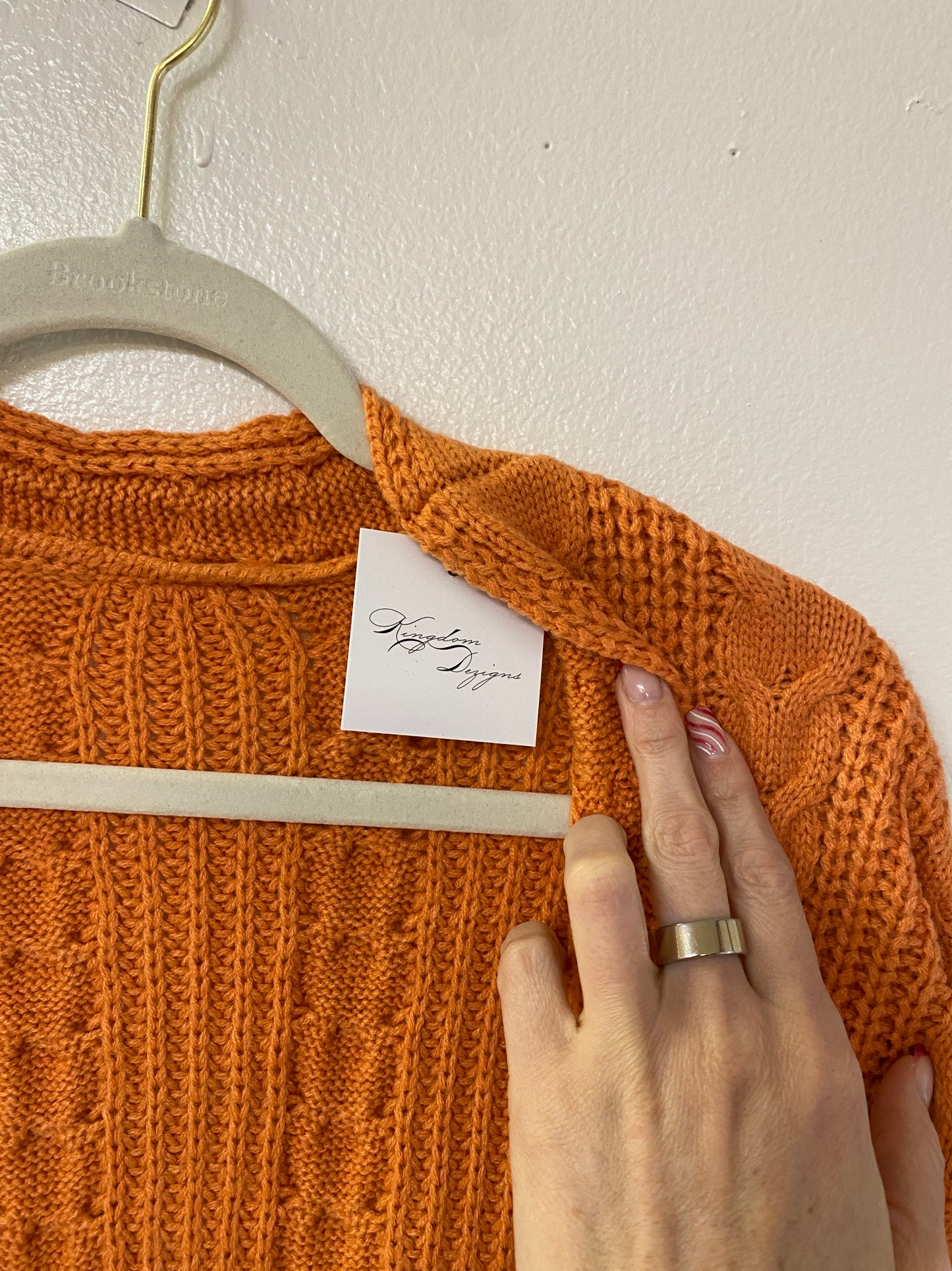 Long orange cable knit cardigan