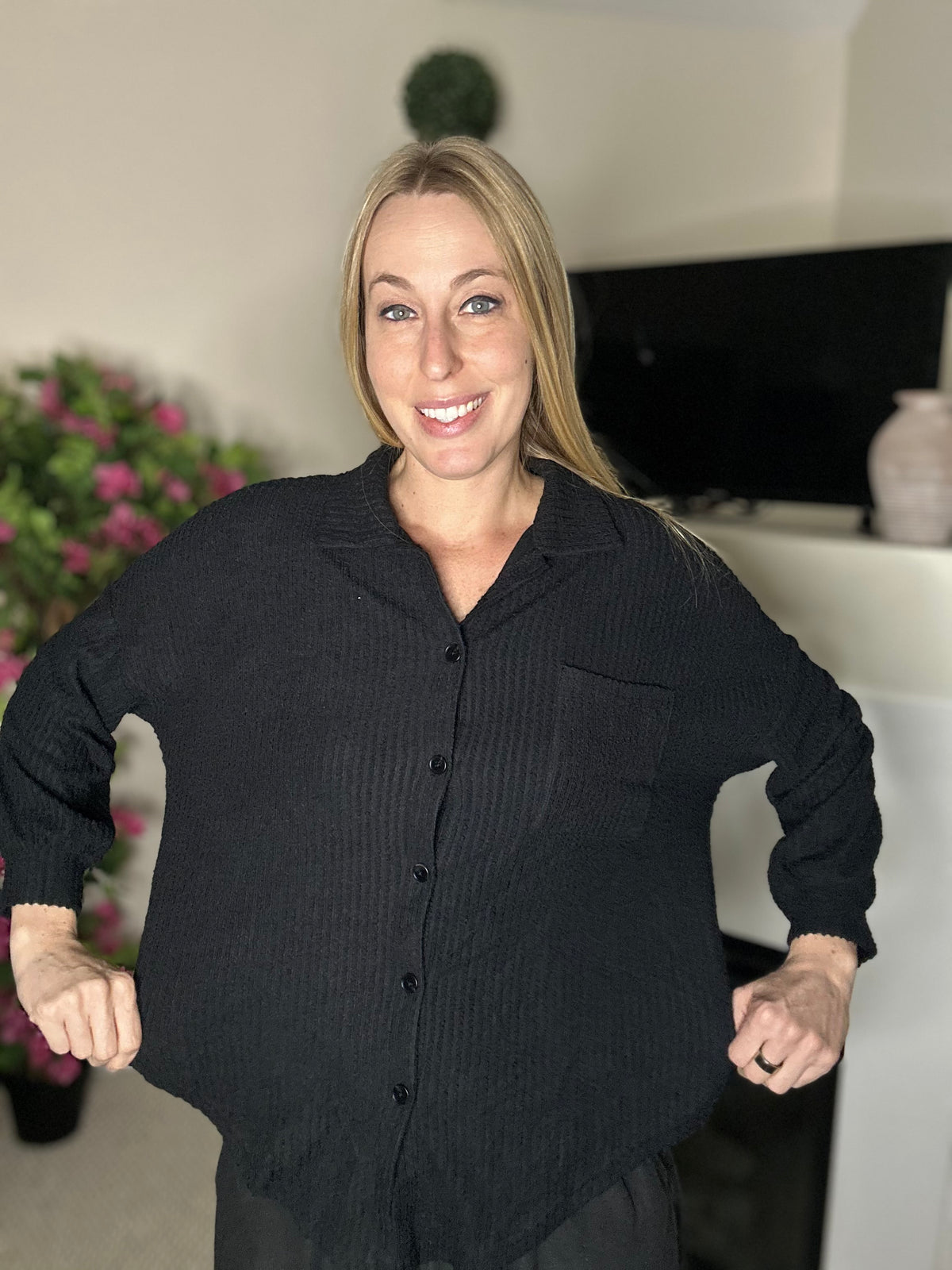 Black relaxed fit waffle knit button down top