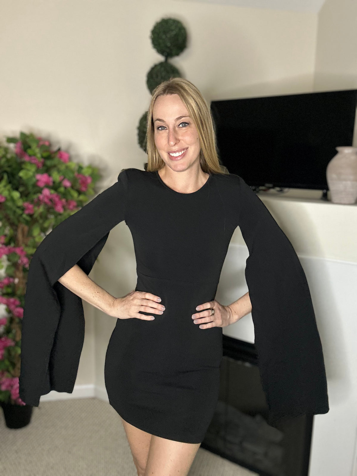 Black cape sleeve mini dress