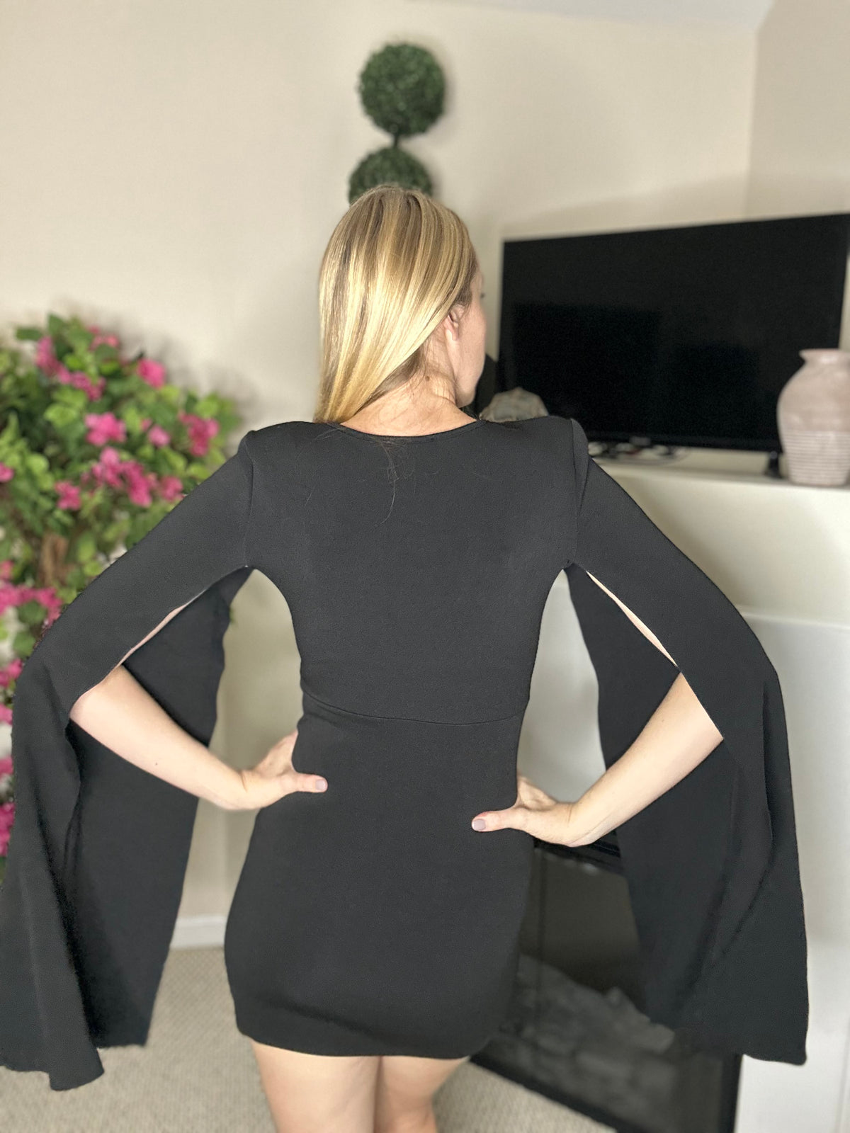 Black cape sleeve mini dress