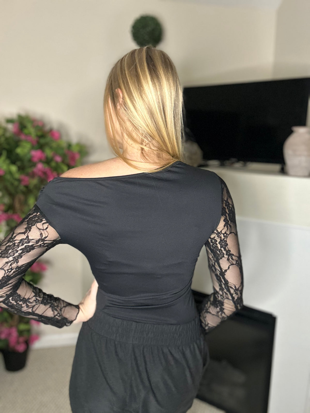 Black lace off the shoulder bodysuit