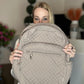 Beige quilted backpack
