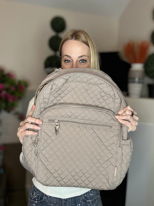 Beige quilted backpack