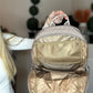Beige quilted backpack