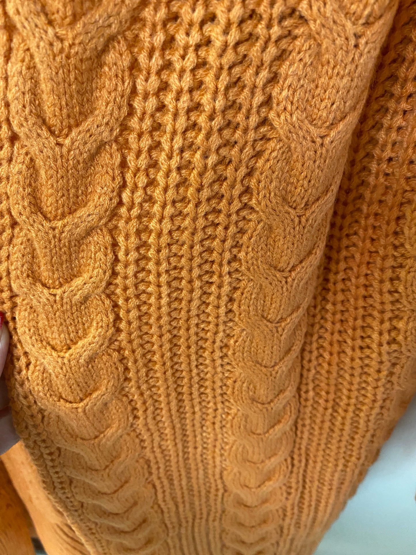 Long orange cable knit cardigan