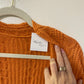 Long orange cable knit cardigan