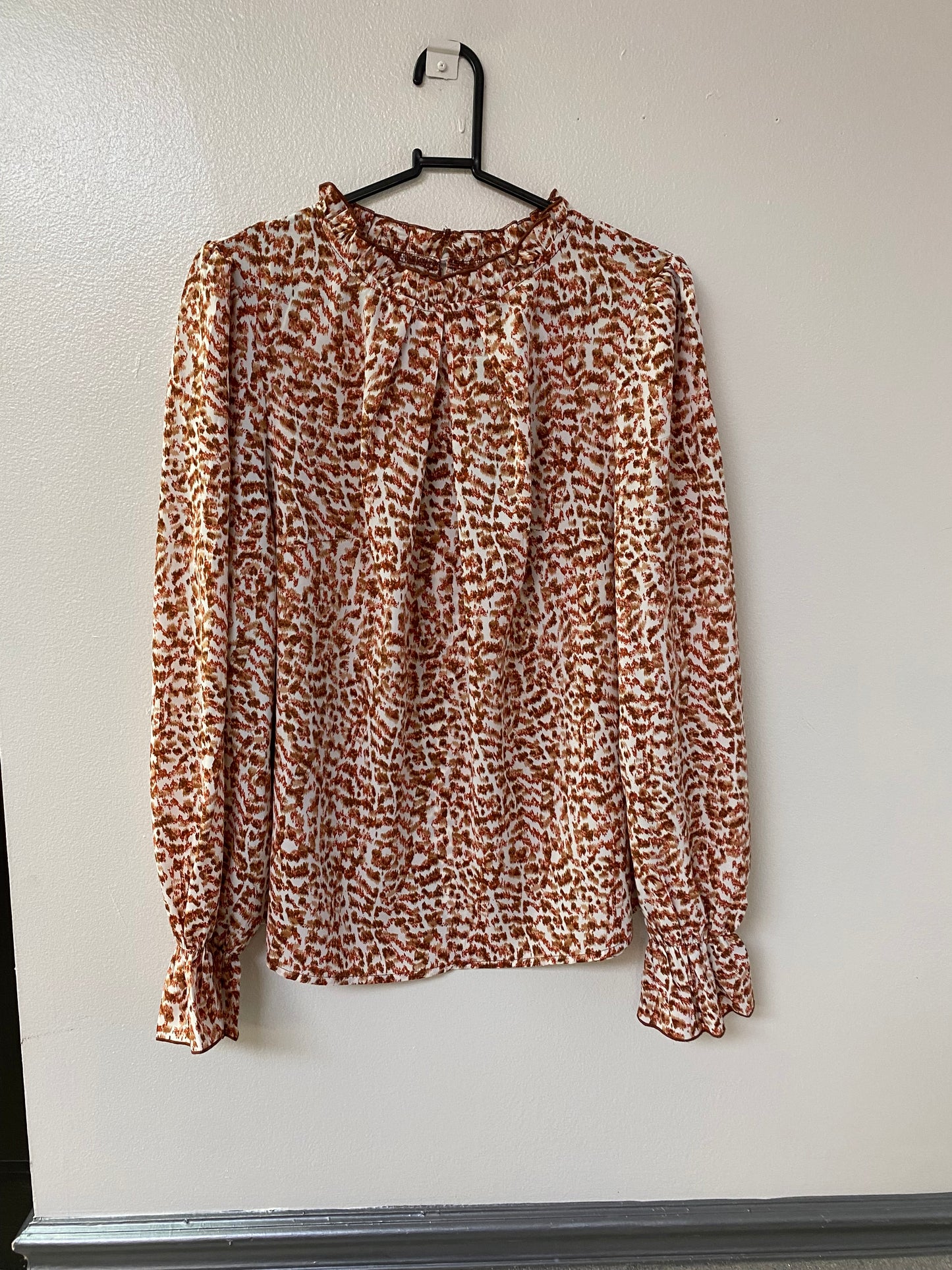 Long sleeve brown patterned blouse