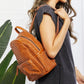 Certainly Chic Faux Leather Woven Backpack