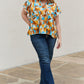 And The Why Full Size Printed Ruffle Baby Doll Top