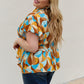 And The Why Full Size Printed Ruffle Baby Doll Top